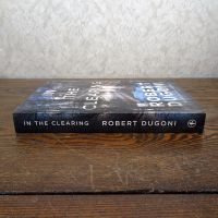 In the Clearing by Robert Dugoni paperback book: Spine - Click to enlarge