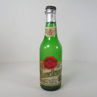 Vintage Pilsner Urquell empty green beer bottle. Original cap, paper label and tin foil: Front - Click to enlarge