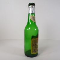 Vintage Pilsner Urquell empty green beer bottle. Original cap, paper label and tin foil: Right - Click to enlarge