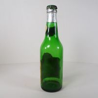 Vintage Pilsner Urquell empty green beer bottle. Original cap, paper label and tin foil: Back - Click to enlarge