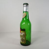 Vintage Pilsner Urquell empty green beer bottle. Original cap, paper label and tin foil: Left - Click to enlarge