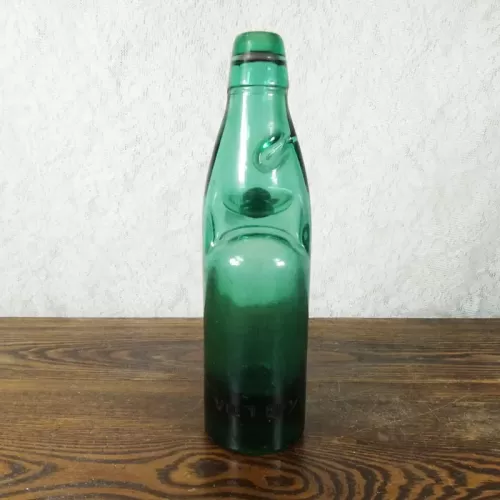 Vintage Codd Neck Victory V soda bottle with rubber ring and marble in heavy thick green glass: Front