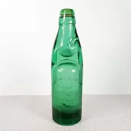Codd bottle with rubber ring and marble inside. A language foreign to me with a bird embossed on the front - Victory: Front