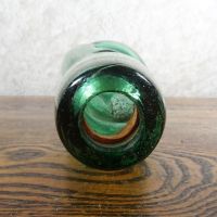 Codd Neck green glass self sealing soda bottle. Original rubber ring, marble. Raised foreign language: Top - Click to enlarge