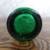 Codd Neck green glass self sealing soda bottle. Original rubber ring, marble. Raised foreign language: Bottom - Click to enlarge