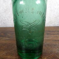 Codd Neck green glass self sealing soda bottle. Original rubber ring, marble. Raised foreign language: Writing Front - Click to enlarge