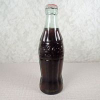 Jackson Mississippi vintage 6 oz full hobbleskirt Coke bottle with red Coca Cola Classic cap: Front - Click to enlarge