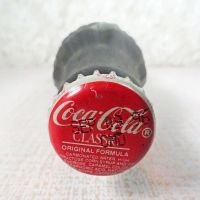 Jackson Mississippi vintage 6 oz full hobbleskirt Coke bottle with red Coca Cola Classic cap: Top - Click to enlarge