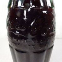 Jackson Mississippi vintage 6 oz full hobbleskirt Coke bottle with red Coca Cola Classic cap: Contents - Click to enlarge