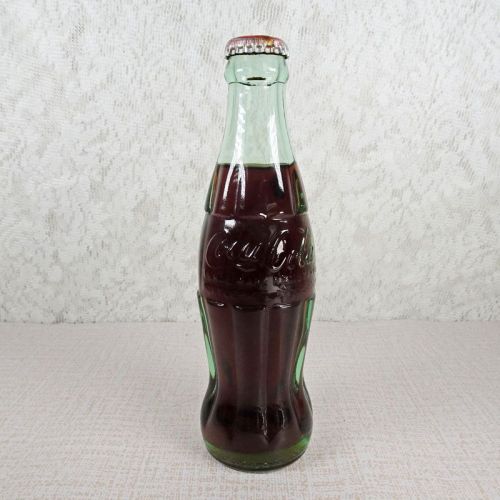 Columbus Ohio Vintage 8 oz full hobbleskirt Coke bottle with red Coca Cola Classic cap: Front