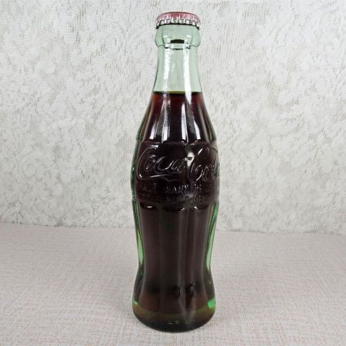 El Paso Texas vintage 6 oz full hobbleskirt Coke bottle with red Coca Cola Classic cap: Front