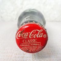 Houston Texas vintage 6-1/2 oz full Coke bottle. White painted graphics. Red Coca Cola Classic cap: Top - Click to enlarge