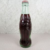 Charlottesville Virginia vintage 8 oz full hobbleskirt no refill Coke bottle. Red Coca Cola Classic cap: Front - Click to enlarge