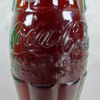 Charlottesville Virginia vintage 8 oz full hobbleskirt no refill Coke bottle. Red Coca Cola Classic cap: Contents - Click to enlarge