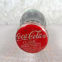 Seattle Washington vintage 8 oz full hobbleskirt no refill Coke bottle. Red Coca Cola Classic cap: Top - Click to enlarge