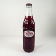 Diet Cheerwine 12 oz. full ACL soda bottle in a clear glass bottle with metal cap: Front