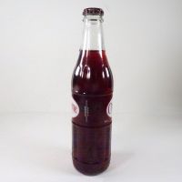 Diet Cheerwine 12 oz. full ACL soda bottle in a clear glass bottle with metal cap: Left - Click to enlarge