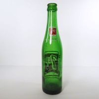 Vintage Seven Up soda bottle with the seven bubble logo. Green glass with red and white ACL graphics: Back - Click to enlarge