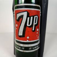 Vintage Seven Up soda bottle with the seven bubble logo. Green glass with red and white ACL graphics: Logo - Click to enlarge