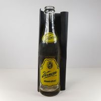 Vernors 1966 vintage 8 fl. oz. empty ACL soft drink bottle with green and yellow graphics: Front on Black - Click to enlarge