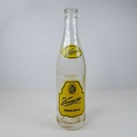 Vernors 1966 vintage 8 fl. oz. empty ACL soft drink bottle with green and yellow graphics: Front - Click to enlarge