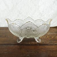 Vintage fruit bowl compote with four short legs. Clear glass with beautiful designs throughout: Front - Click to enlarge