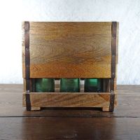 Vintage six bottle wood box caddy with metal straps, cutout handles and small opening to see the bottles: With Bottles - Click to enlarge