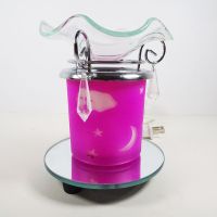 Electric oil warmer featuring a pink night sky of white stars, moon and clouds. Round mirror base: Left - Click to enlarge