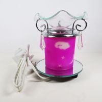 Electric oil warmer featuring a pink night sky of white stars, moon and clouds. Round mirror base: Back - Click to enlarge