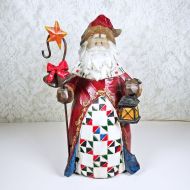 Vintage Santa 9.5” Christmas figurine. Staff with red bow and gold star in one hand. Lantern in the other: Front