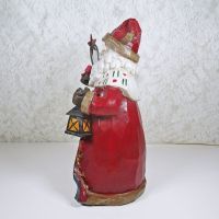 Vintage Santa 9.5” Christmas figurine. Staff with red bow and gold star in one hand. Lantern in the other: Left - Click to enlarge