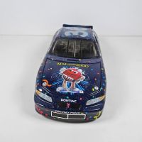 Nascar Ernie Irvan #36 Action Racing M&M Millennium 1999 Pontiac diecast stock car. Box with sleeve: Front - Click to enlarge