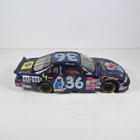 Nascar Ernie Irvan #36 Action Racing M&M Millennium 1999 Pontiac diecast stock car. Box with sleeve: Right - Click to enlarge