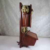 Vintage replica of an antique wood wall telephone with pushbuttons, a simulated crank handle, storage compartment and more: Right - Click to enlarge