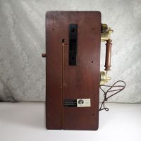 Vintage replica of an antique wood wall telephone with pushbuttons, a simulated crank handle, storage compartment and more: Back - Click to enlarge