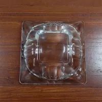 Vintage 4-5/8" square clear glass ashtray with 3 indented rounded bars each side: Bottom - Click to enlarge