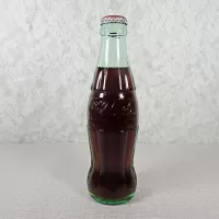 Akron Ohio vintage 8 oz full hobbleskirt no refill Coke bottle. Coca Cola Classic cap. Aqua glass: Front - Click to enlarge