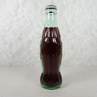Akron Ohio vintage 8 oz full hobbleskirt no refill Coke bottle. Coca Cola Classic cap. Aqua glass: Left - Click to enlarge