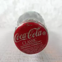 Akron Ohio vintage 8 oz full hobbleskirt no refill Coke bottle. Coca Cola Classic cap. Aqua glass: Top - Click to enlarge