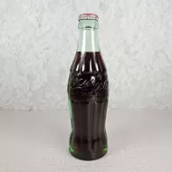 Atlanta Georgia vintage 6 oz full hobbleskirt Coke bottle with red Coca Cola Classic cap: Front