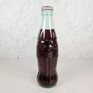 Springfield Illinois vintage 8 oz full hobbleskirt no refill Coke bottle with Coca Cola Classic cap: Front