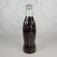 Dallas Texas vintage 6 oz full hobbleskirt Coke bottle with Red Coca Cola Classic cap: Back - Click to enlarge