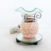 Electric scented oil tart warmer with white crackle design on orange background. Round mirror base: Front - Click to enlarge