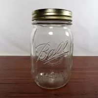 Vintage Ball mason jar with measuring increments on sides of the jar. Design on gold lid and back: Front - Click to enlarge