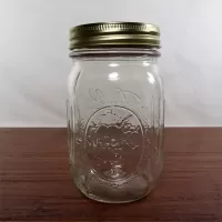 Vintage Ball mason jar with measuring increments on sides of the jar. Design on gold lid and back: Back - Click to enlarge