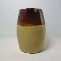 Antique glazed stoneware pitcher with handle. Brown top, beige bottom, band of a third color separating them: Front - Click to enlarge