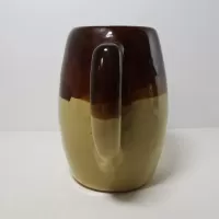 Antique glazed stoneware pitcher with handle. Brown top, beige bottom, band of a third color separating them: Back - Click to enlarge